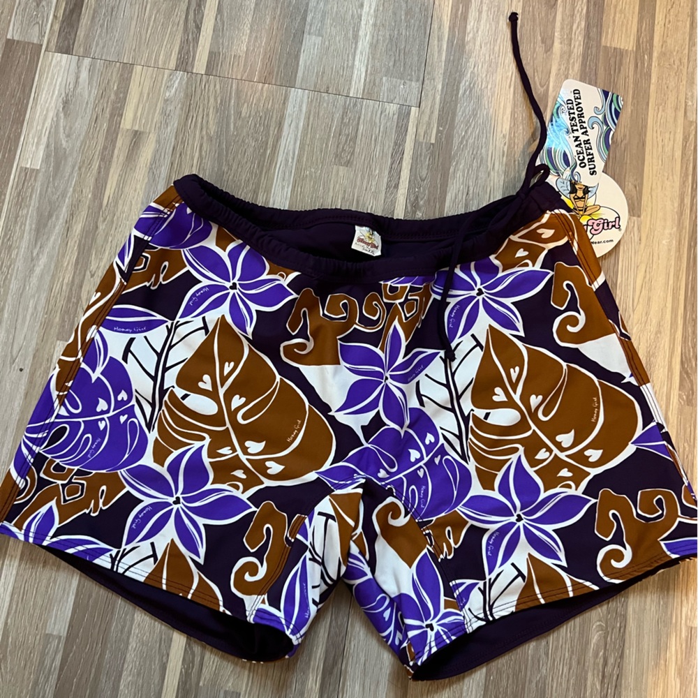 Surf shorts, tags on